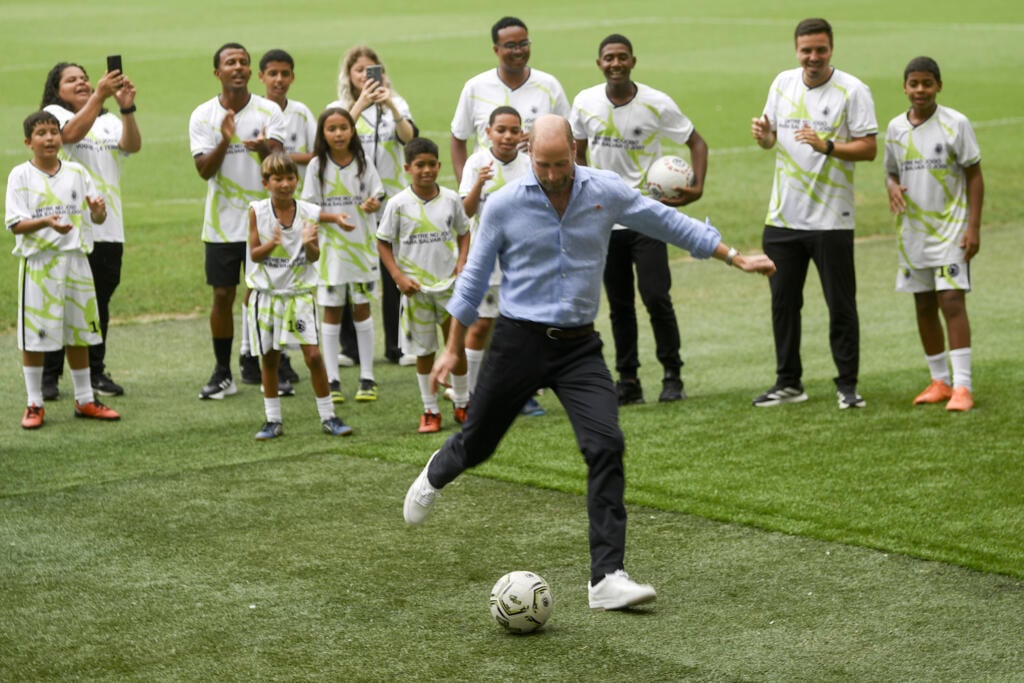 Prince William plays football with Brazilian pro on climate trip