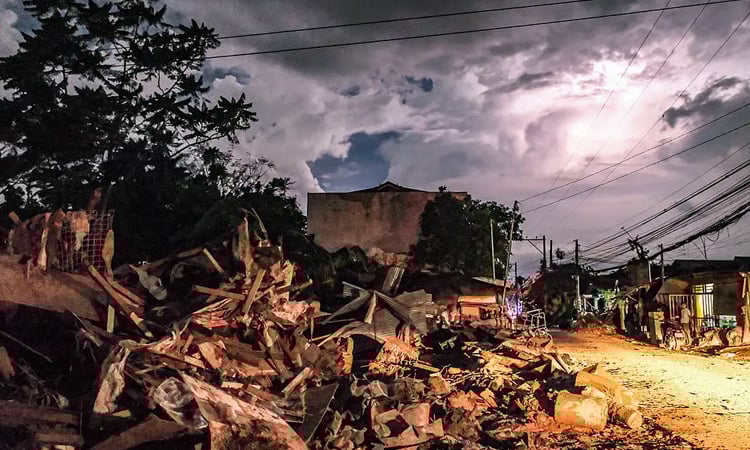 Storm, scandal-plagued Philippine economy grows just 4% in Q3