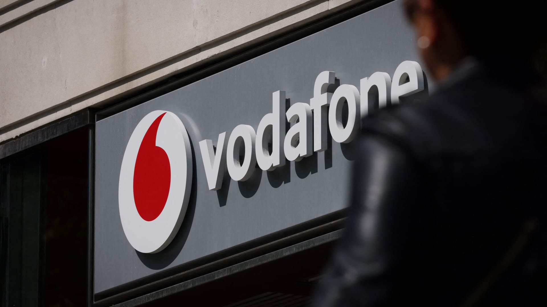 Vodafone lifts outlook on Germany rebound, UK tie-up