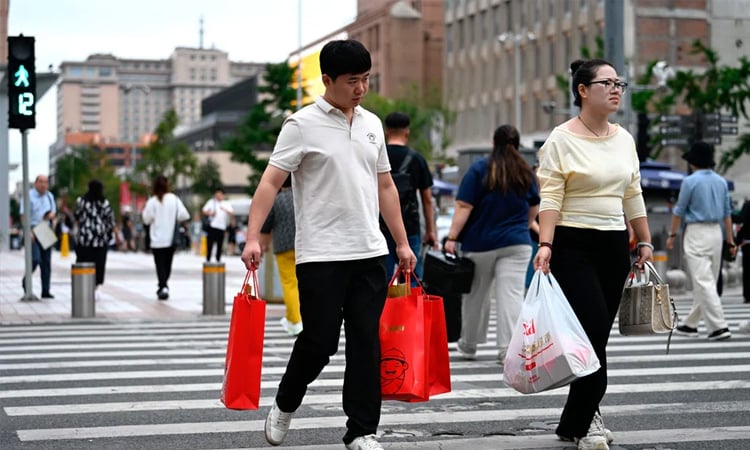 China retail sales, industrial production growth slowed in October