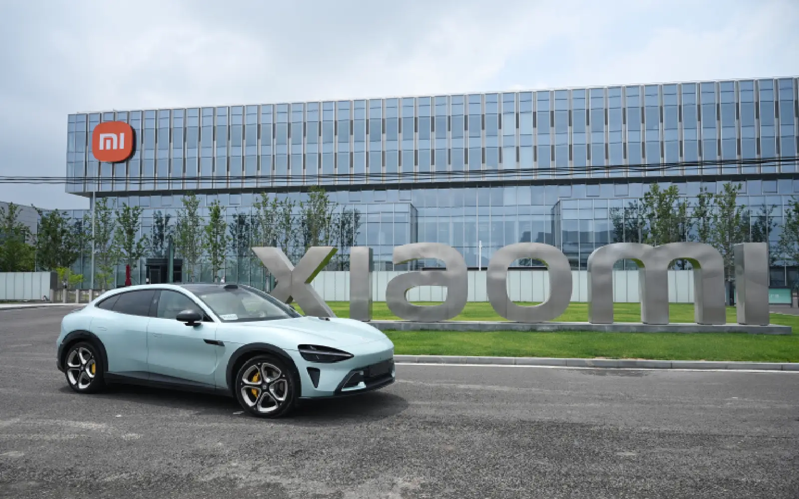 Xiaomi says electric cars and AI now profitable