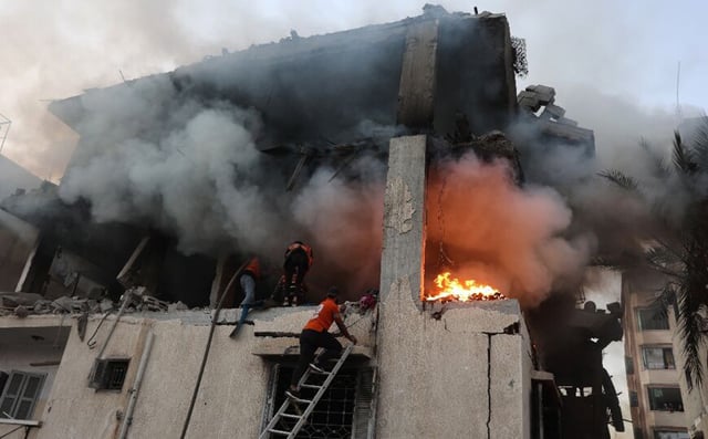 Gaza civil defence says 21 killed in Israeli strikes