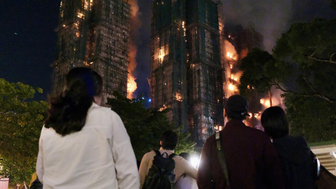 'Very worried': Hong Kong fire survivors hunt for the missing