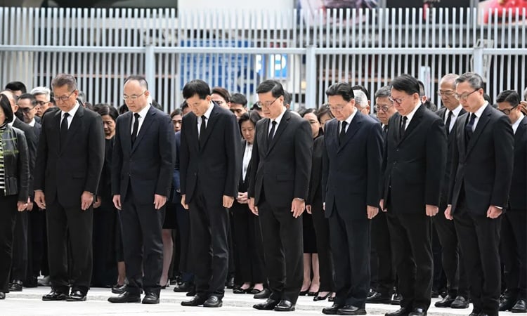 Hong Kong begins mourning period after fire kills at least 128