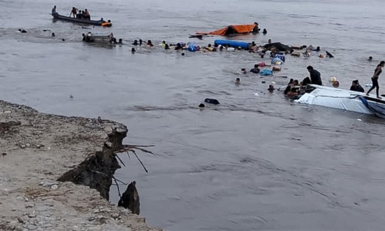 Twelve dead, dozens missing as landslide submerges boats in Peru port