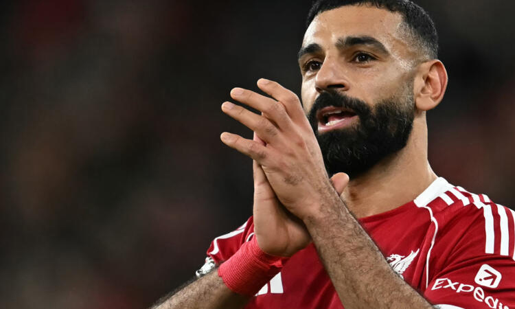 Salah back in Liverpool fold as Arsenal grab last-gasp win