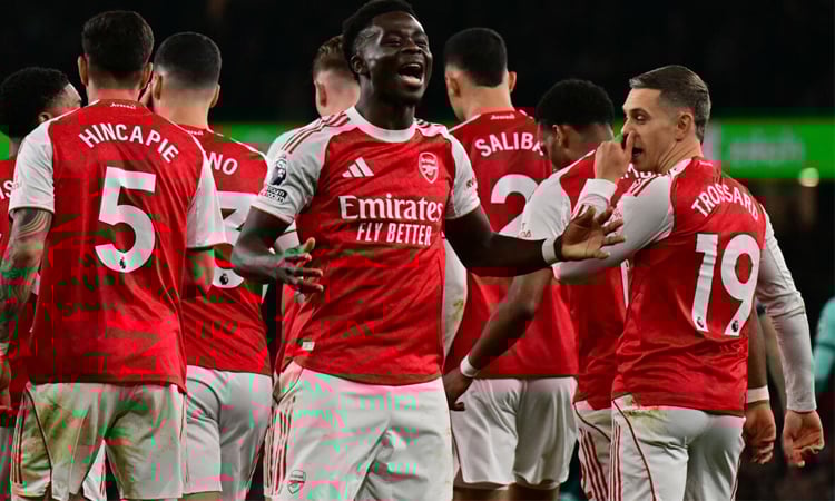 Two own goals save Arsenal blushes against Wolves