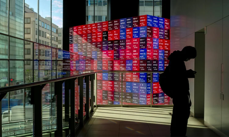 Asian markets track Wall St lower as AI fears mount