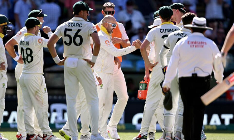 Australia four wickets from Ashes glory as England cling on
