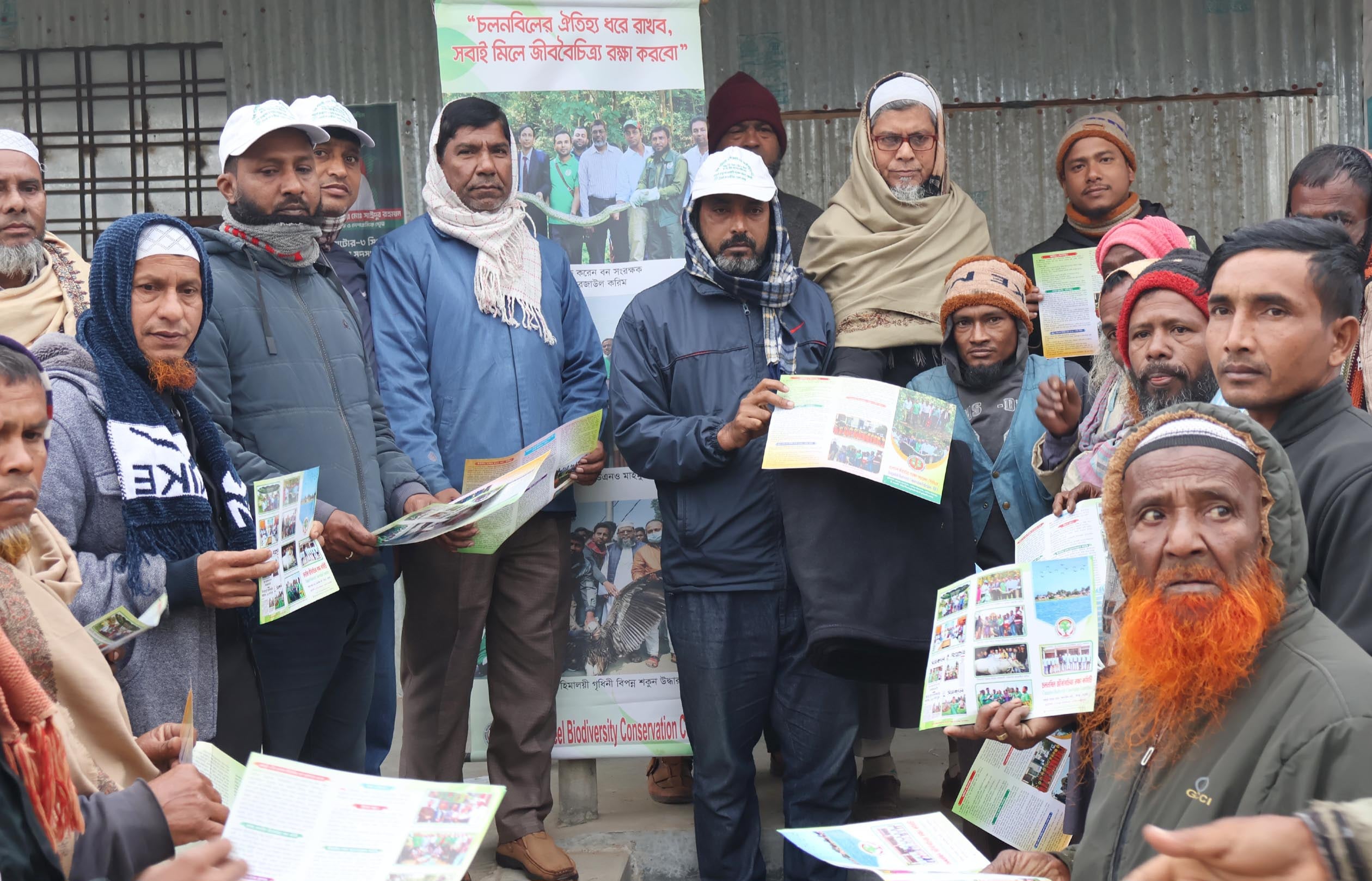 Winter clothes gifted to bird poaching informants in Natore's Chalan Beel