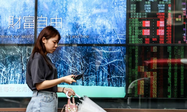 Asian markets rally with Wall St as rate hopes rise, AI fears ease