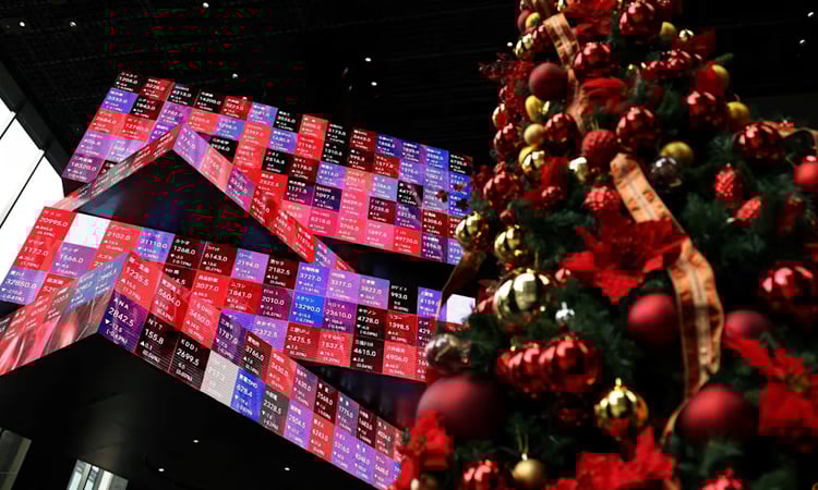 Asian markets mostly up after US growth fuels Wall St record