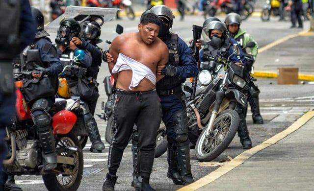 Embattled Venezuela releases dozens of jailed dissenters