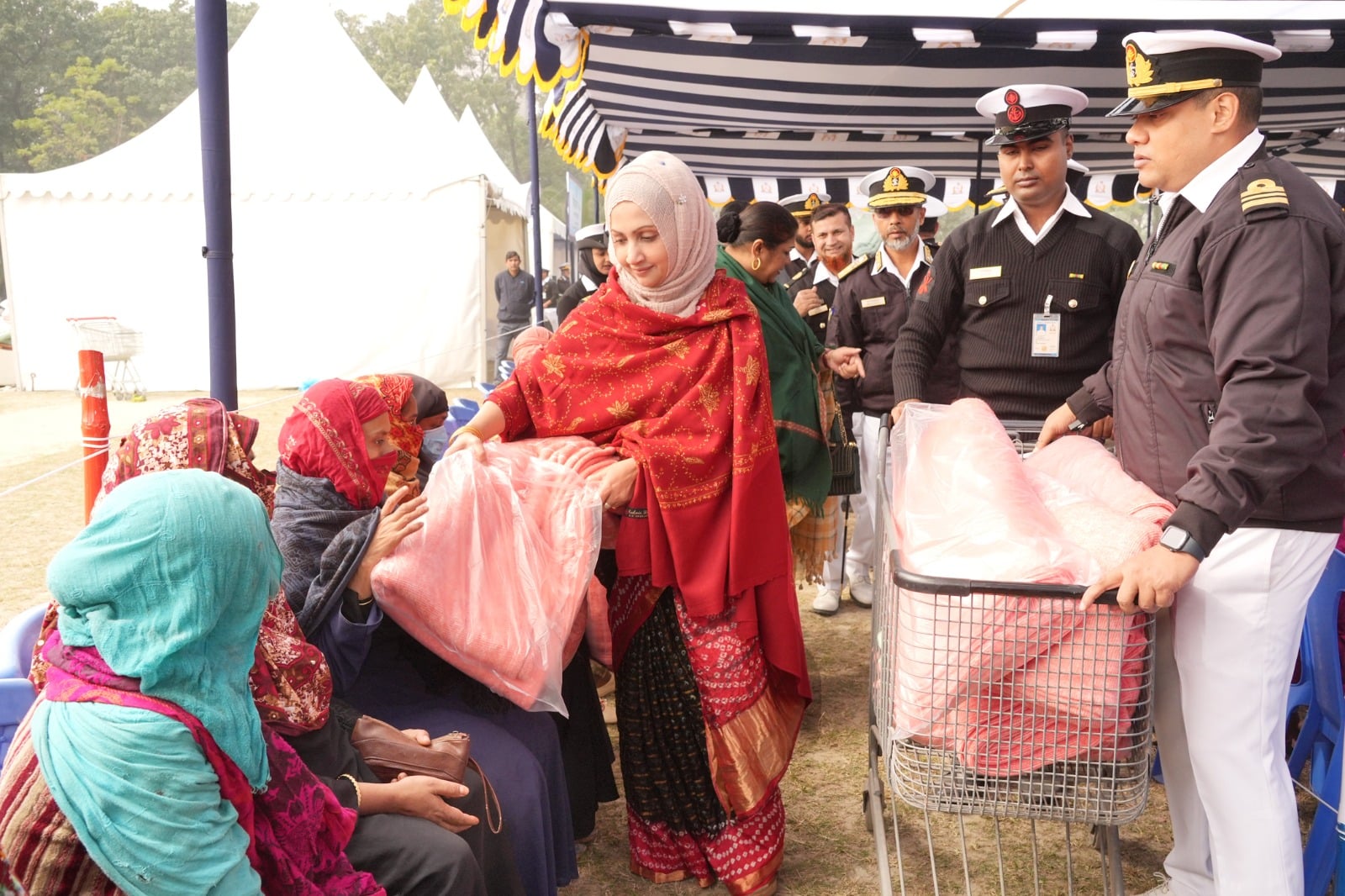 Navy Family Welfare Association distributes winter clothes in Mirpur