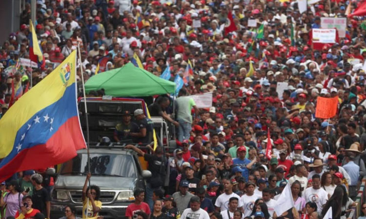 Venezuela buries victims of US attack, demos demand Maduro return