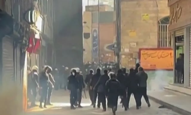 Iran forces accused of firing on protesters as death toll mounts