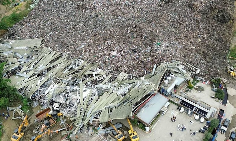 Death toll climbs after trash site collapse buries dozens in Philippines