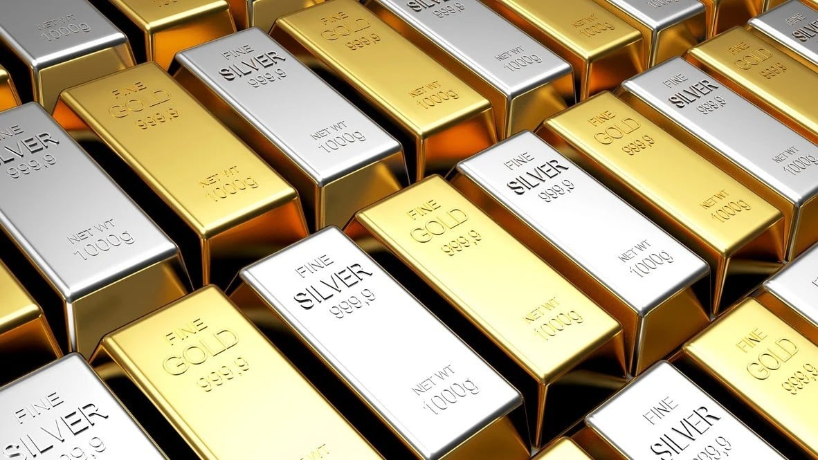 Gold, silver hit records after US probe targets Fed