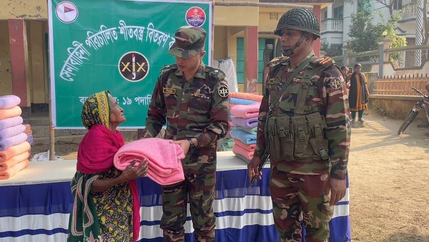 Army distributes winter clothes among cold-hit people in Kishoreganj