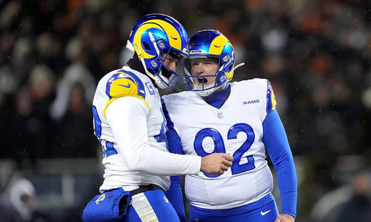 Rams fend off Bears comeback as Patriots advance in NFL playoffs