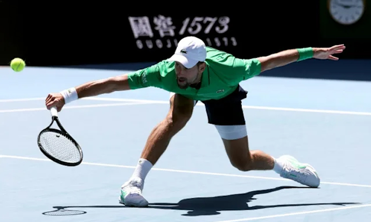 Keys revels in Melbourne heat as Djokovic steps up history bid