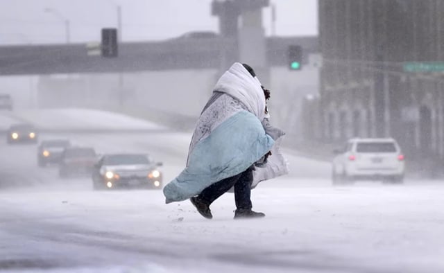 Massive winter storm sweeps across US bringing ice, frigid temps