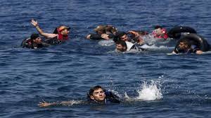 Woman, boy drown off Greece after migrant boat sinks