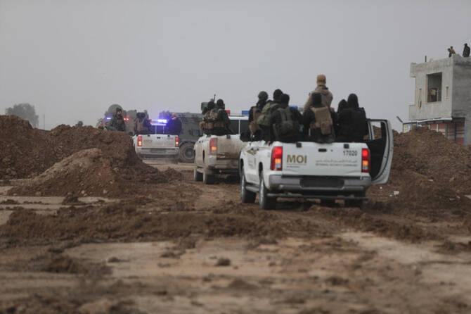 Security officer arrested over Syria killings: official