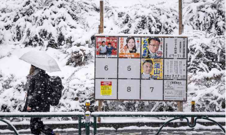 Japan votes in snow-hit snap polls as Takaichi eyes strong mandate