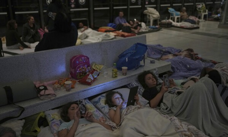 Israelis head to shelters after Iran fires missiles