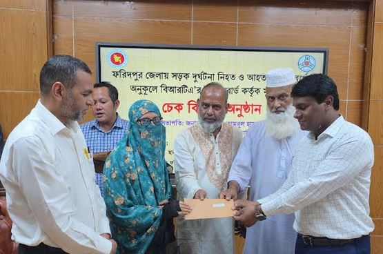 Cheques distributed among road accident victims in Faridpur