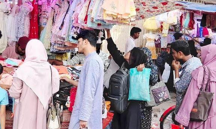 Overflowing crowds at Rajshahi's sidewalk shops ahead of Eid