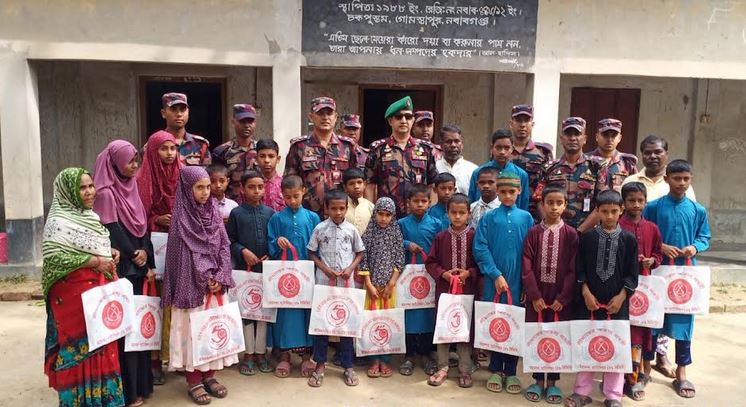 BGB distributes eid gifts to orphans in Chapainawabganj