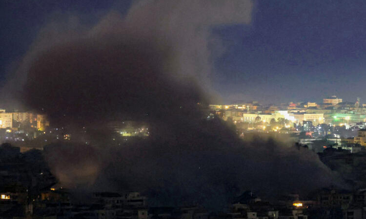 Israel pounds south Beirut, says captured Hezbollah members