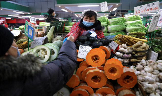 China consumer prices rise, factory gate ends deflation streak