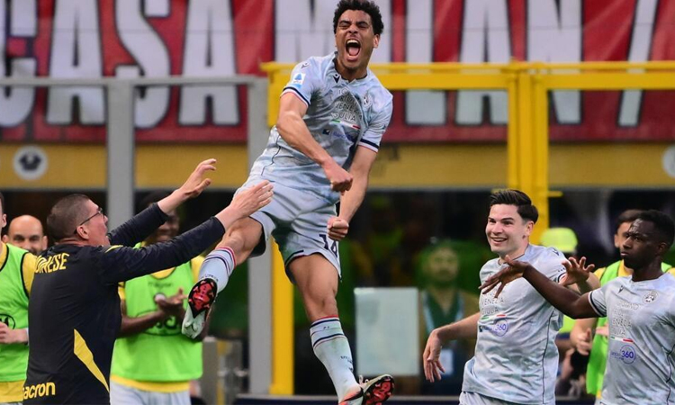 Milan's Serie A title hopes in tatters after shock Udinese defeat