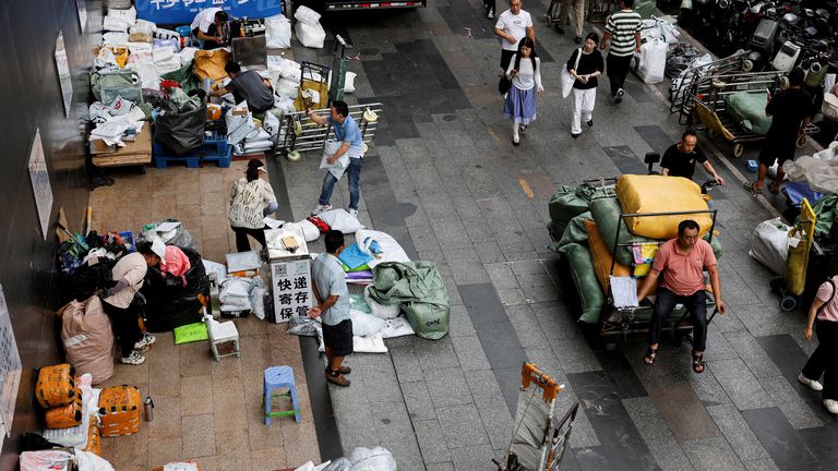 China says economy grew 5% on-year in Q1, beating forecasts