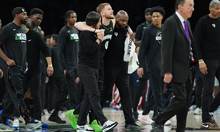 Timberwolves' Edwards, DiVincenzo exit playoff game with injuries