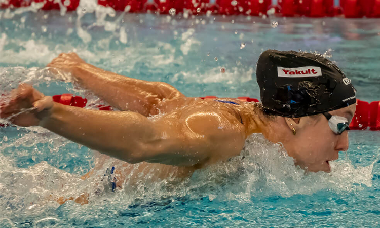 Walsh clocks 54.33 to break 100m fly world record