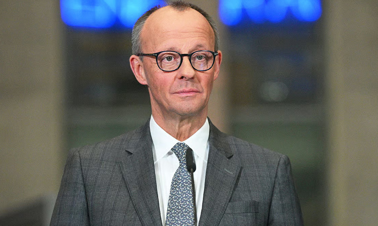 Germany's Merz says not 'giving up on working with Donald Trump'
