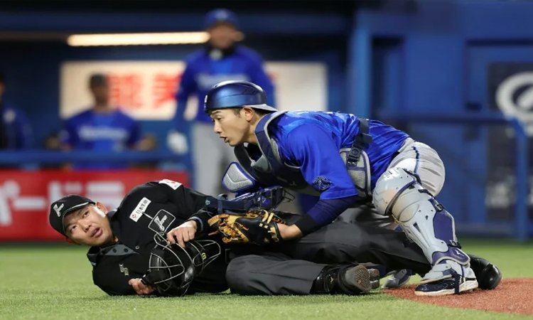 Japan baseball mulls punishments for dangerous swings after umpire hit