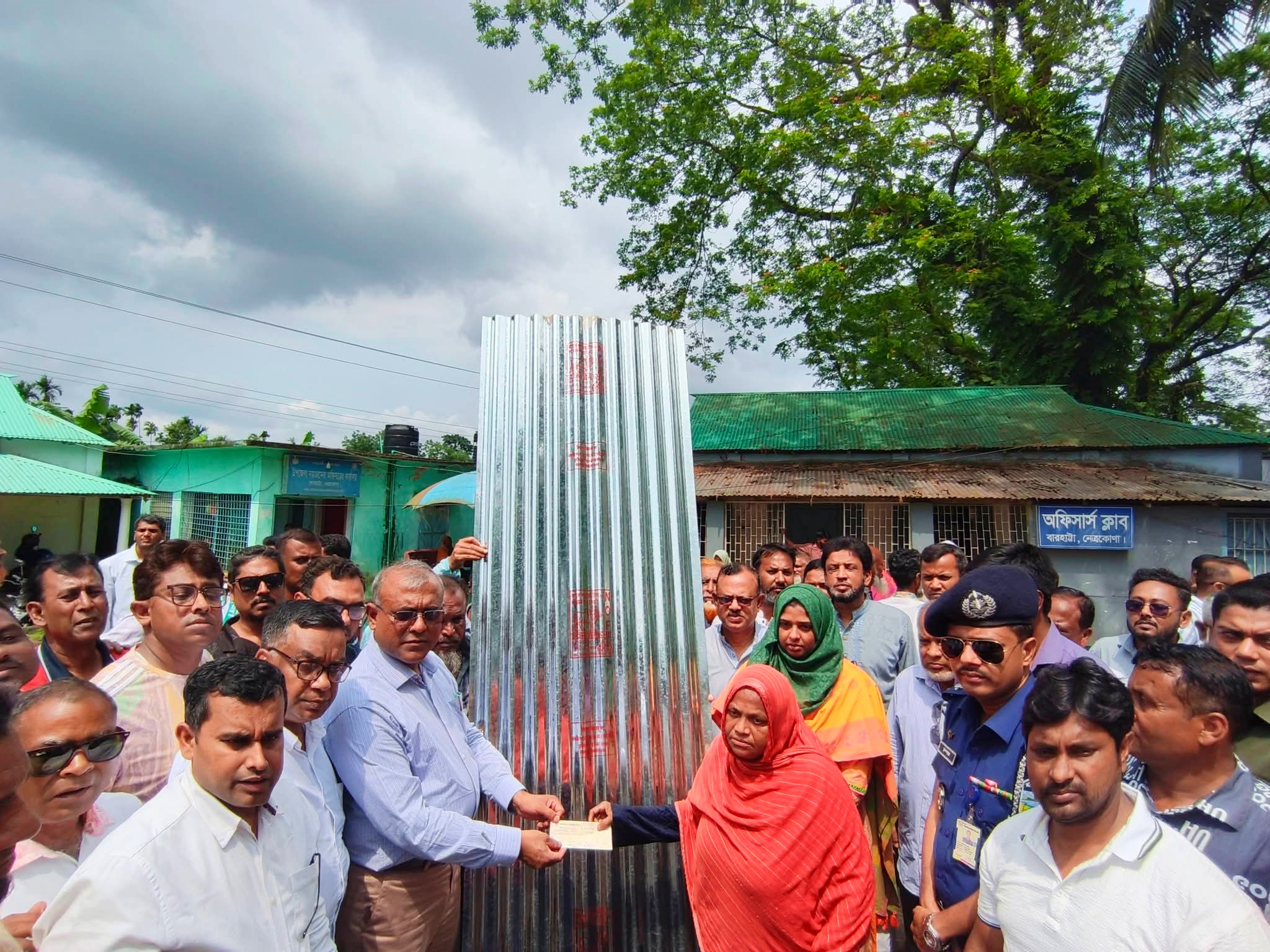 29 disaster-affected families receive CI sheets, cash assistance in Netrokona