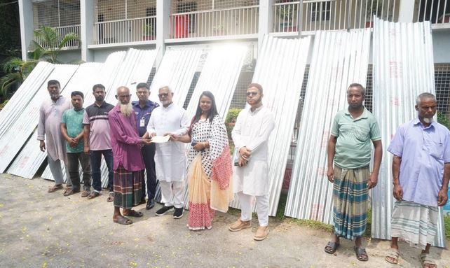 Corrugated tin, cash aid distributed among fire victims in Dinajpur