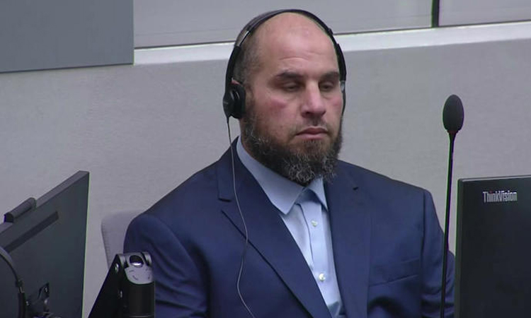 Libyan ex-prison boss faces ICC war crimes hearing