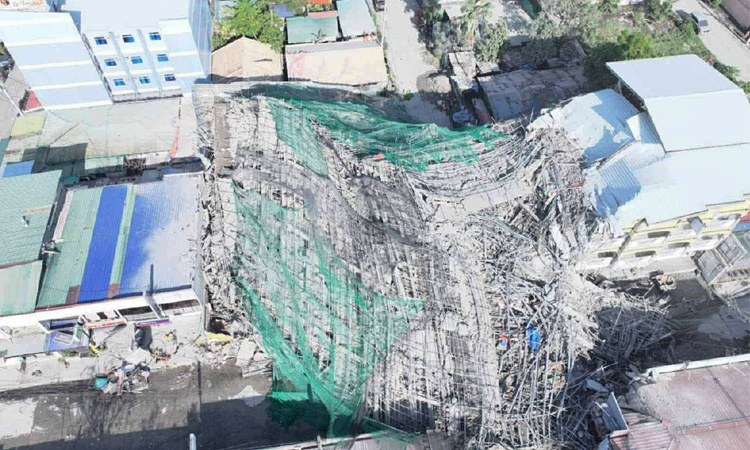 19 feared trapped after collapse at Philippines construction site