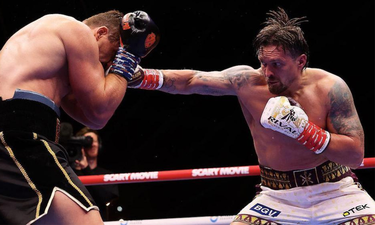 Usyk rocked before stopping Verhoeven to retain heavyweight belts