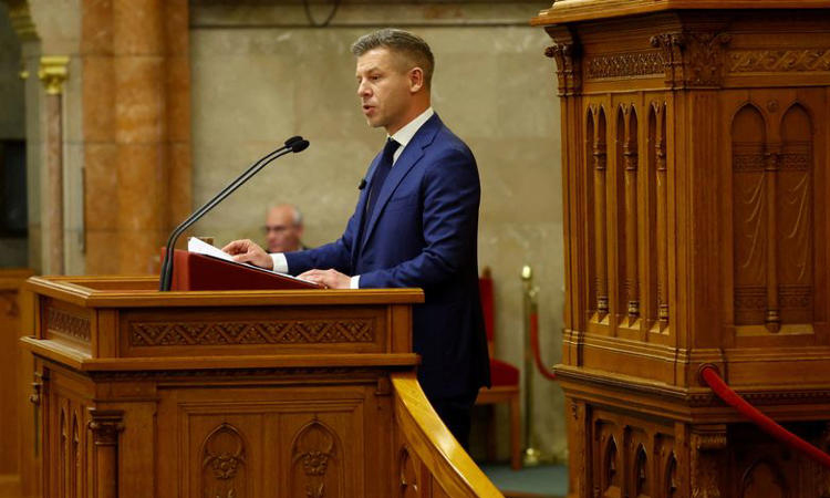 Hungary's PM in Brussels frozen funds talks with EU chief