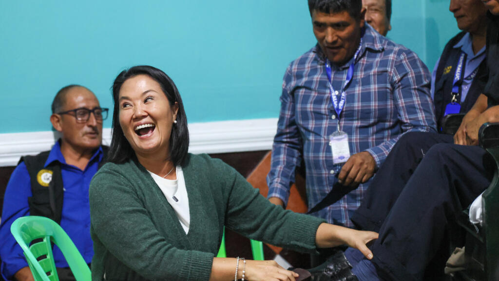 Peru votes in tight runoff as Fujimori makes fresh bid for power