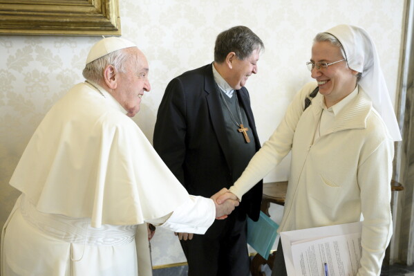 Pope names first lay woman to head Vatican department