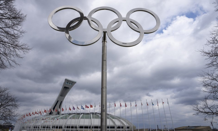 50 years after Olympic glory, Comaneci's homecoming sparks hope of new path to perfection